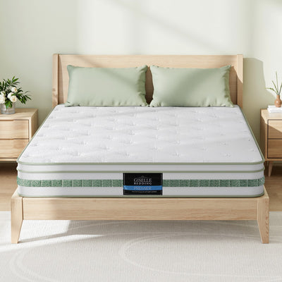 Mint Series Euro Top Mattress 20cm Thick – King on wooden bed frame with green pillows in bright bedroom setting