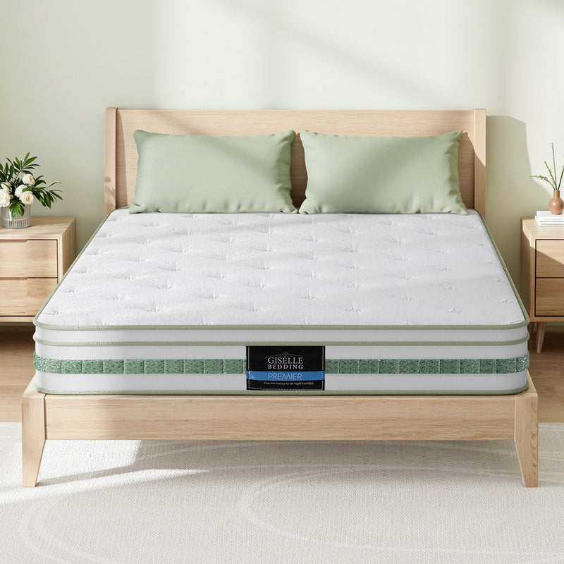 Mint Series Euro Top Mattress 20cm Thick – King on wooden bed frame with green pillows in bright bedroom setting