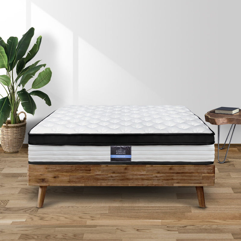 Devon Euro Top Pocket Spring Mattress 31cm Thick - Single on wooden bed frame in modern bedroom setting with plant and side table