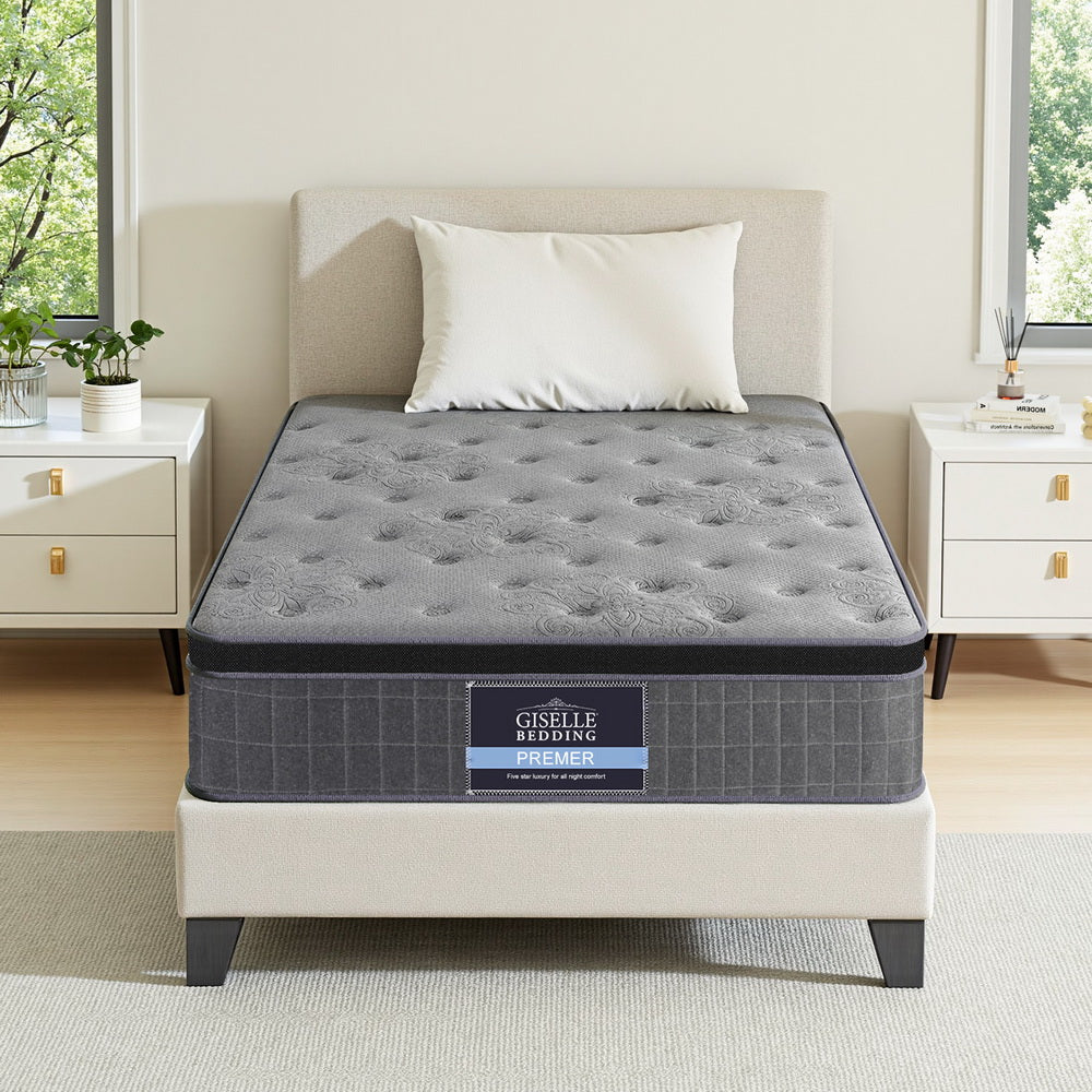 26cm Mattress King Single Latex Foam Mattresses with gray quilted top and beige upholstered bed frame in bedroom setting