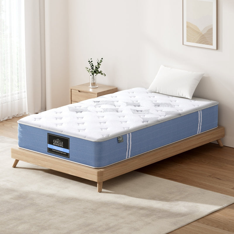 Snow Series Euro Top Bamboo Fibre Mattress 25cm Thick - Single on wooden bed frame with white pillow in minimalist bedroom