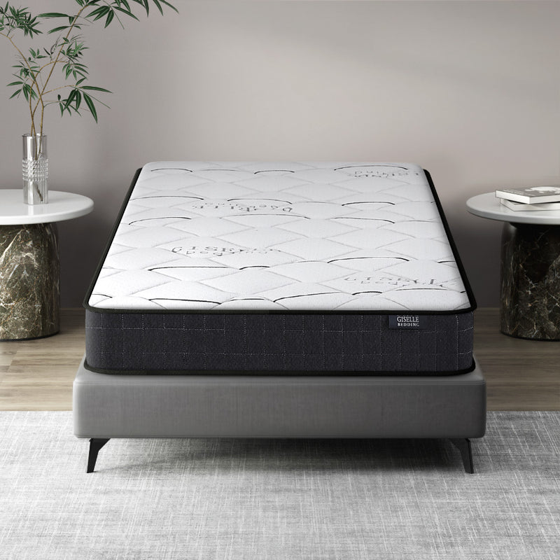 Glay Bonnell Spring Mattress 16cm Thick - Single on gray bed frame, with two round side tables and decorative items