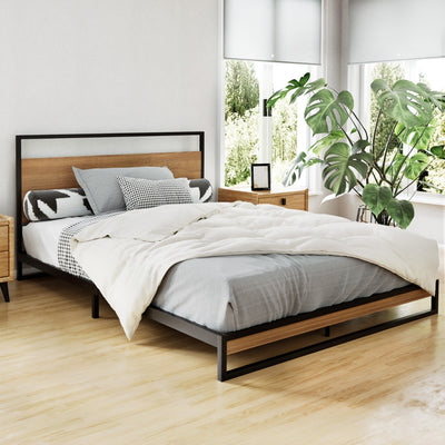 Stockton Double Bed Frame in black metal with wooden headboard, styled with bedding and bedroom furniture in natural light room
