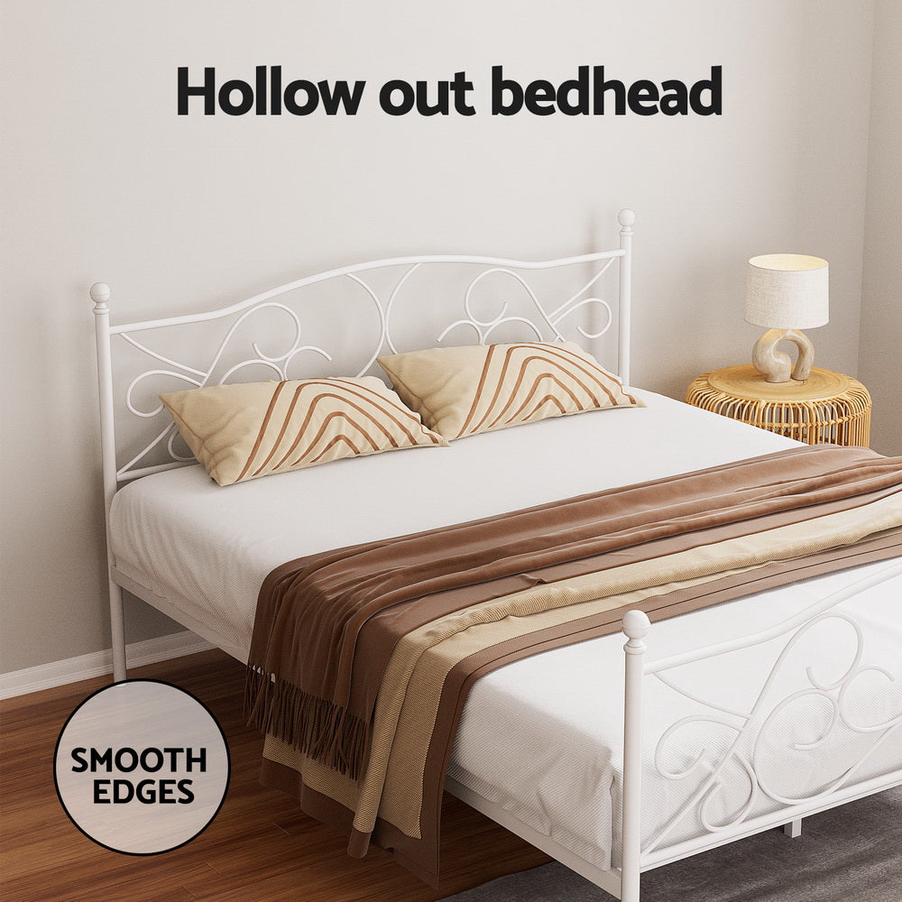 Provincial Style Metal Queen Bed Frame - White with hollow-out headboard, smooth edges, and decorative curved metal design in bedroom setting