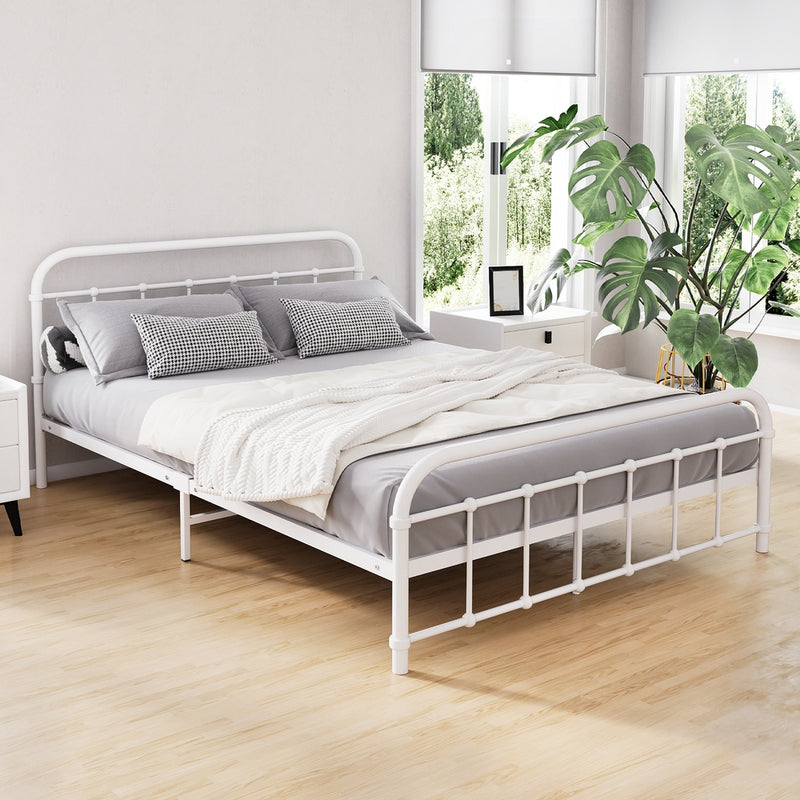 Leo Metal Double Bed Frame White in modern bedroom setting with gray bedding and bedside tables with plants
