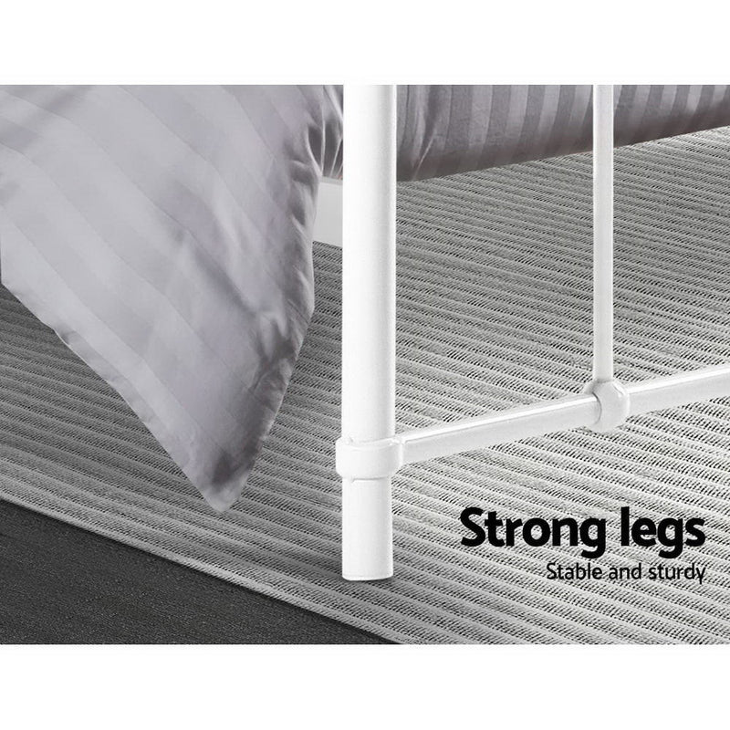 Close-up of sturdy white metal legs on the Leo Metal Queen Bed Frame White showing solid construction and support
