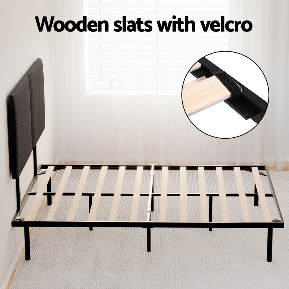 Norwood Queen Modern Bed Frame Black showing wooden slats with velcro on black metal frame in bright bedroom setting