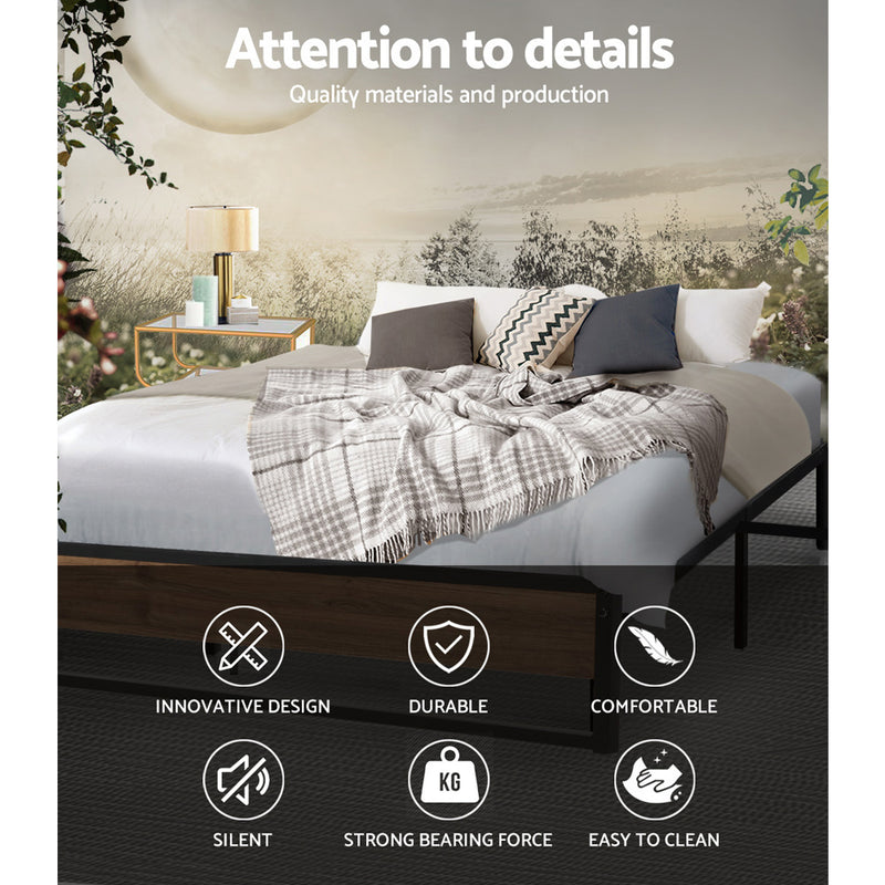 Oslo Metal Queen Bed Frame with metal and wood construction, shown in styled bedroom setting with cushions and throw blanket