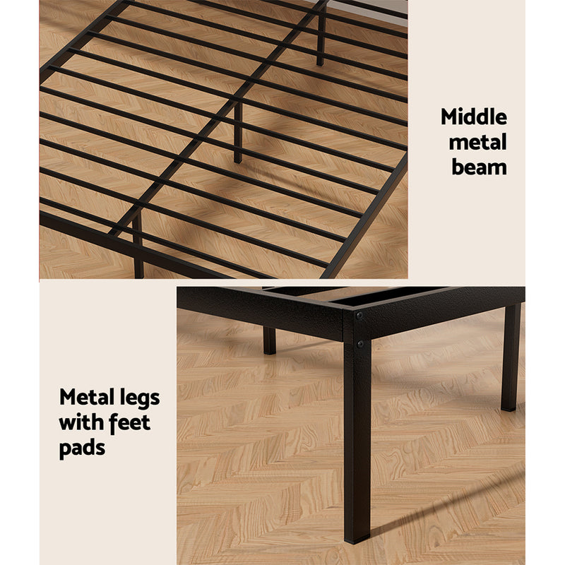 Paula Double Metal Bed Frame Black With Wooden Headboard showing metal slats, middle beam, and legs with feet pads on wood floor