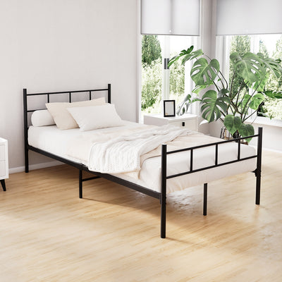 Wategos Metal King Single Bed Frame Black with simple steel design in bright bedroom setting with pillows and white bedding