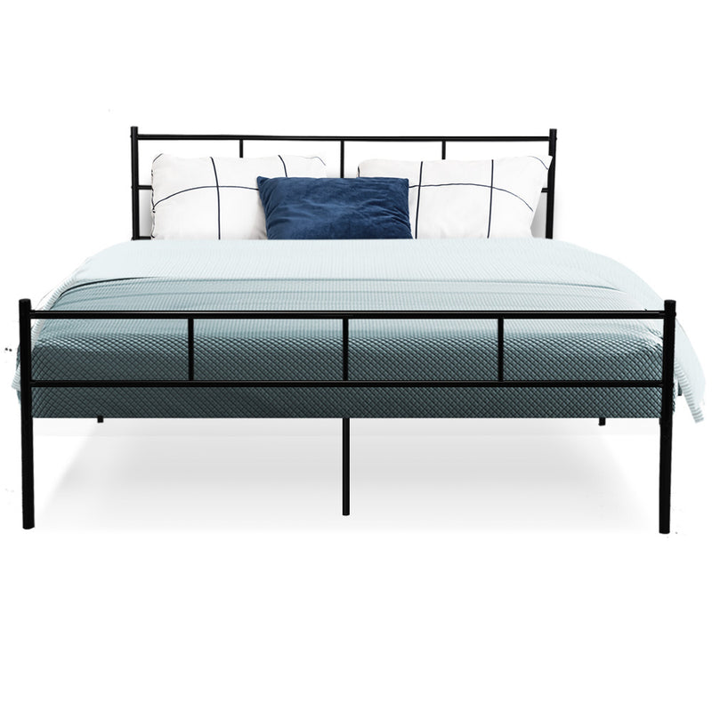 Wategos Metal Queen Bed Frame Black with sleek black steel design, styled with pillows and light blue bedding on white background