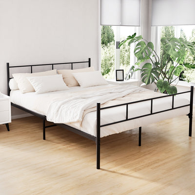 Wategos Metal Queen Bed Frame Black with simple black steel design in a bright bedroom setting with neutral bedding and green plant