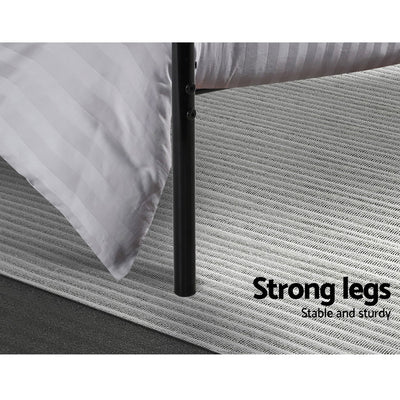 Wategos Metal Single Bed Frame Black showing sturdy black metal leg on textured rug in bedroom setting