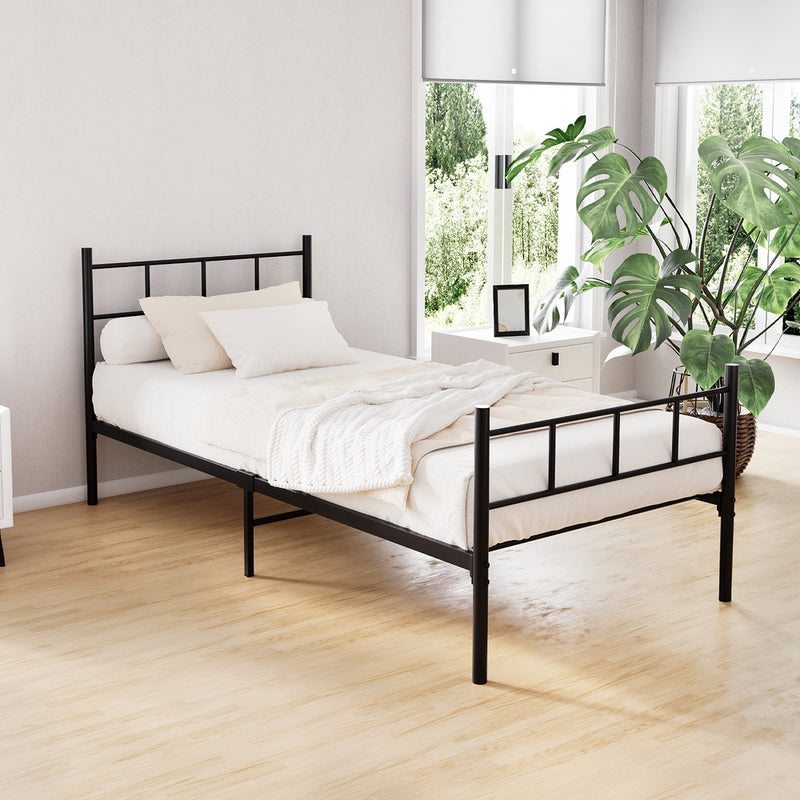 Wategos Metal Single Bed Frame Black in sleek steel with minimalist design set in a bright bedroom with plants and natural light