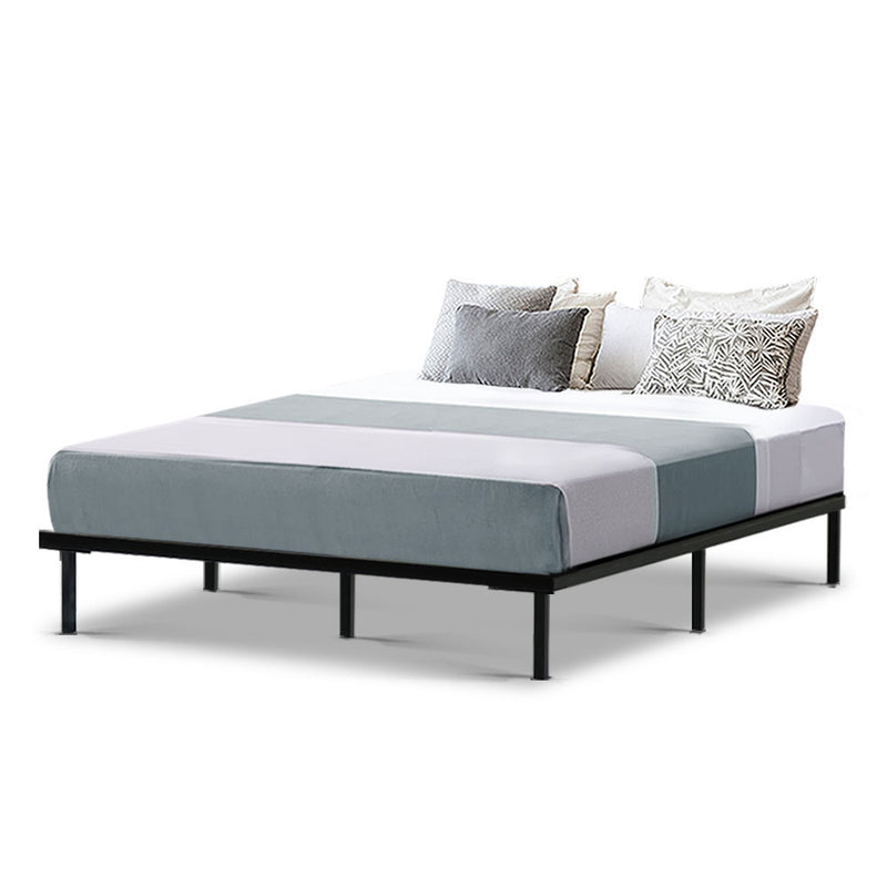 Basic Series Metal Queen Bed Frame Black with simple black steel frame, no headboard, shown with mattress and pillows