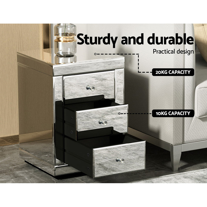 Mirrored Bedside Table Drawers Furniture Mirror Glass Presia Silver with three drawers and sturdy design next to sofa in bedroom setting