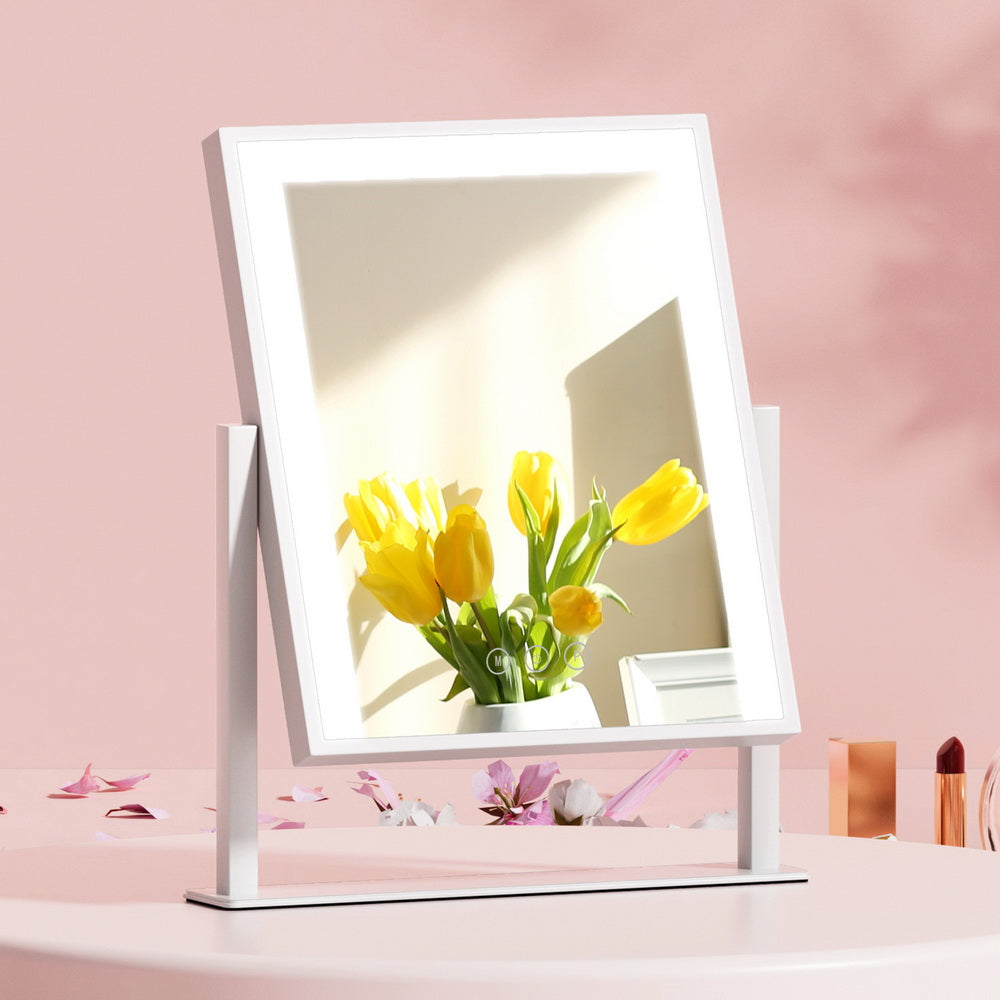 Makeup Mirror 25x30cm Hollywood Vanity with LED Light Rotation White on pink table reflecting yellow tulips and sunlight