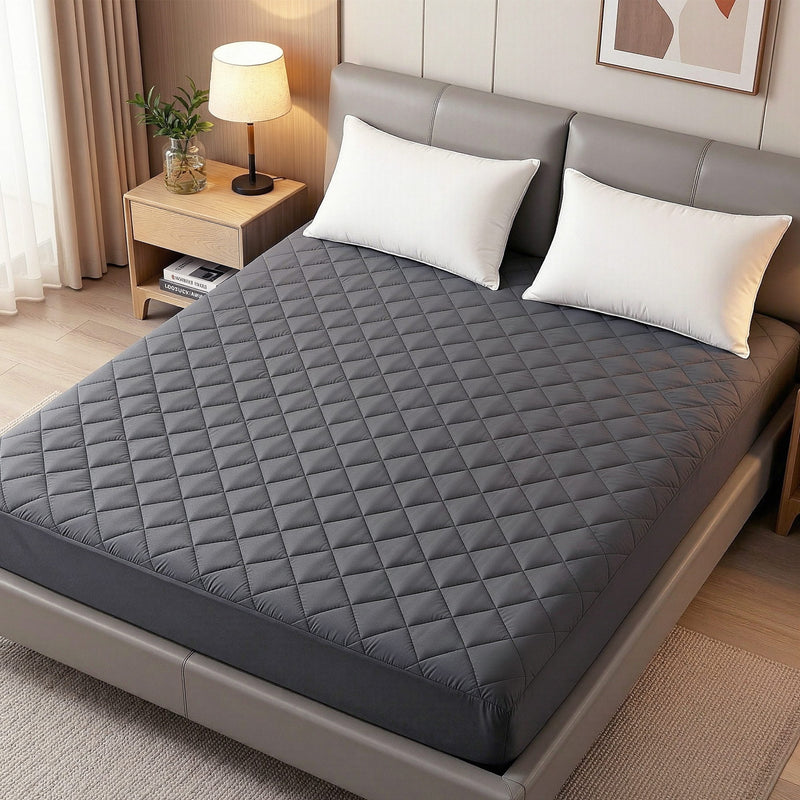 Water-Resistant Mattress Protector Microfiber 360° Fit King on gray bed with white pillows in modern bedroom setting