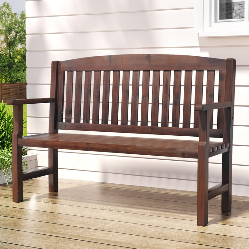 Outdoor Garden Bench Wooden 2 Seater Lounge Chair Patio Furniture Brown with slatted back and armrests on wooden deck
