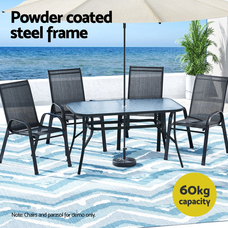 140cm Outdoor Dining Table With Glass Top and Parasol Hole – Black with powder-coated steel frame on patio setting