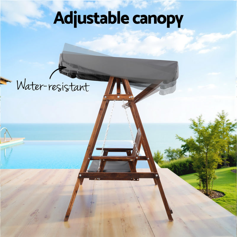 Wooden Swing Chair Garden Bench Canopy 3 Seater Outdoor Furniture with adjustable water-resistant canopy on patio overlooking pool and garden