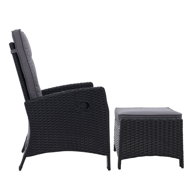 Set of 2 Elise Outdoor Recliner Chairs with Ottomans Black featuring woven wicker design and padded cushions in side view