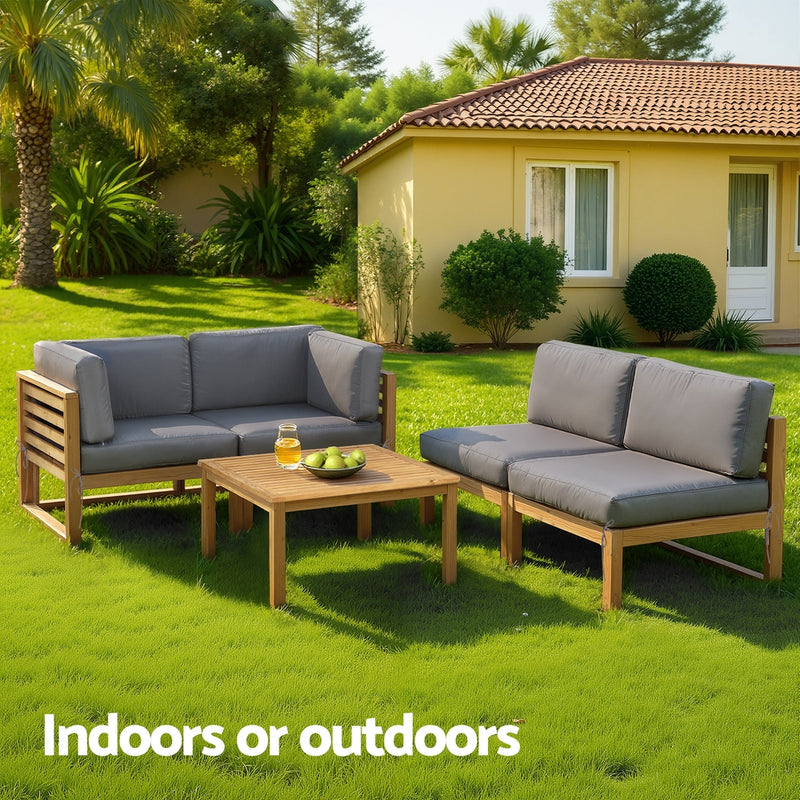 4-Piece Outdoor Sofa Set Wooden Couch Lounge Setting 5PCS with gray cushions and wooden frame on green lawn outdoors