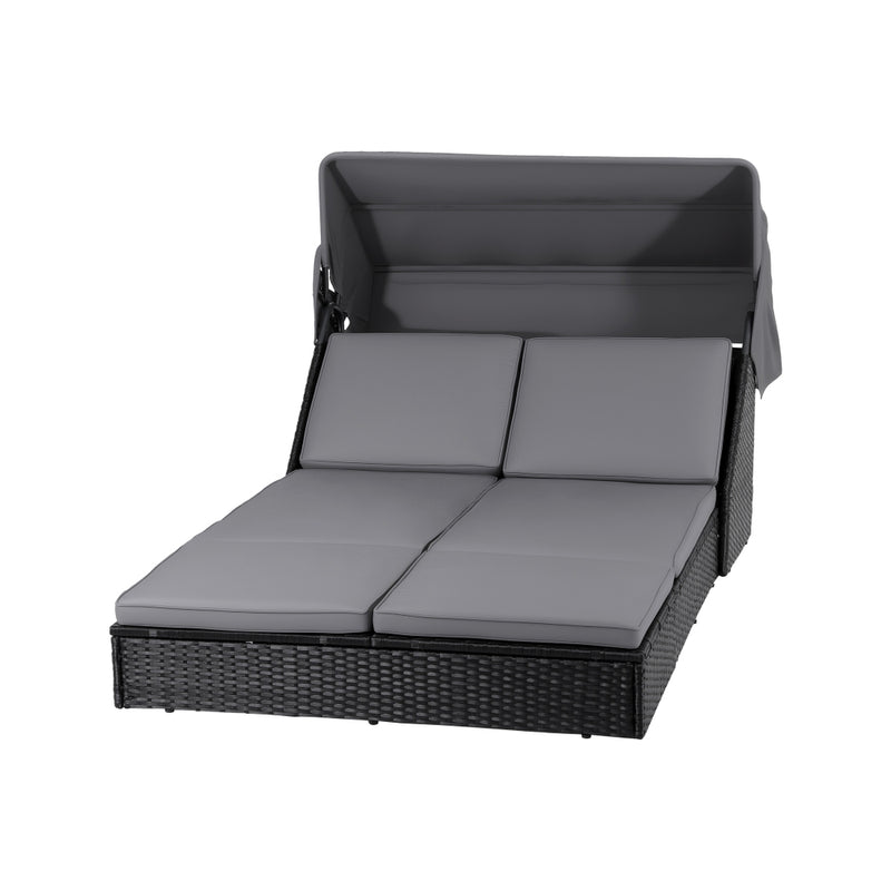 Outdoor Day Bed Sun Lounge Setting Wicker Lounger Patio Furniture with adjustable canopy and gray cushions on black background