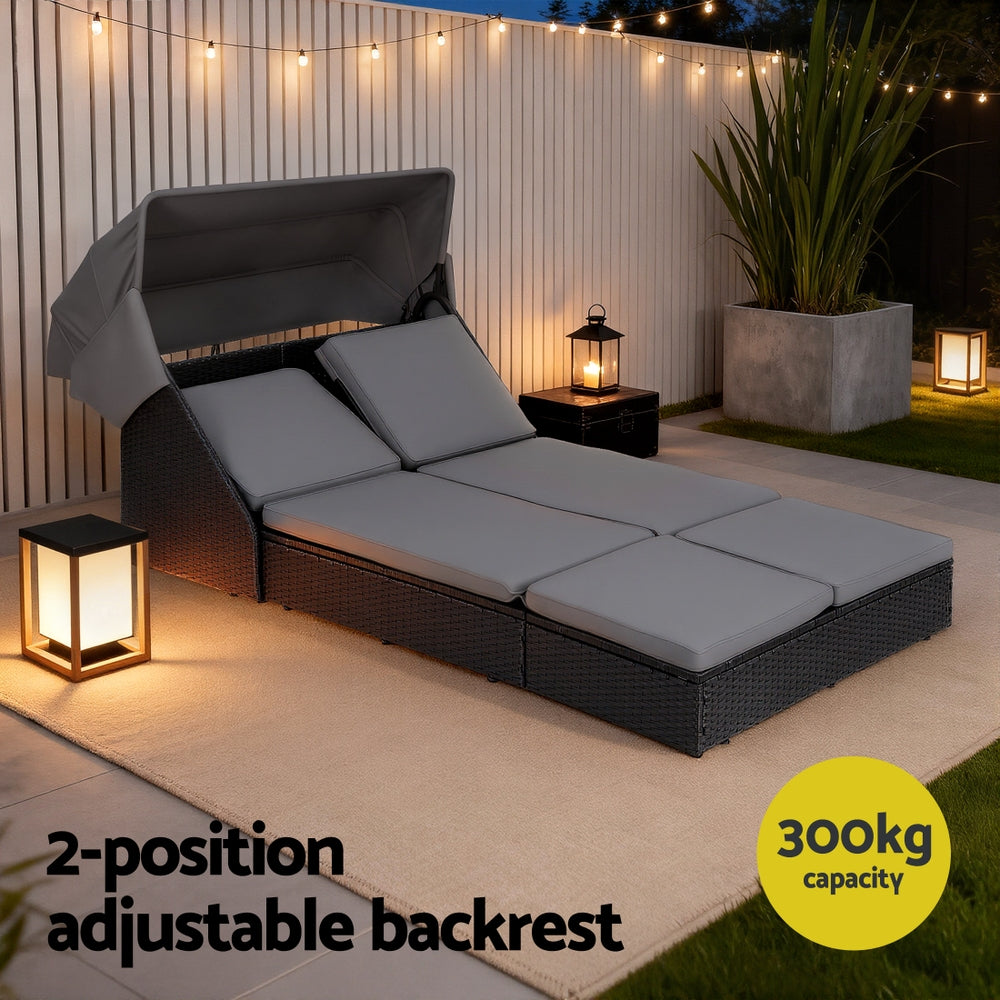 Outdoor Day Bed Sun Lounge Setting Wicker Lounger Patio Furniture with adjustable backrest and gray cushions in outdoor setting