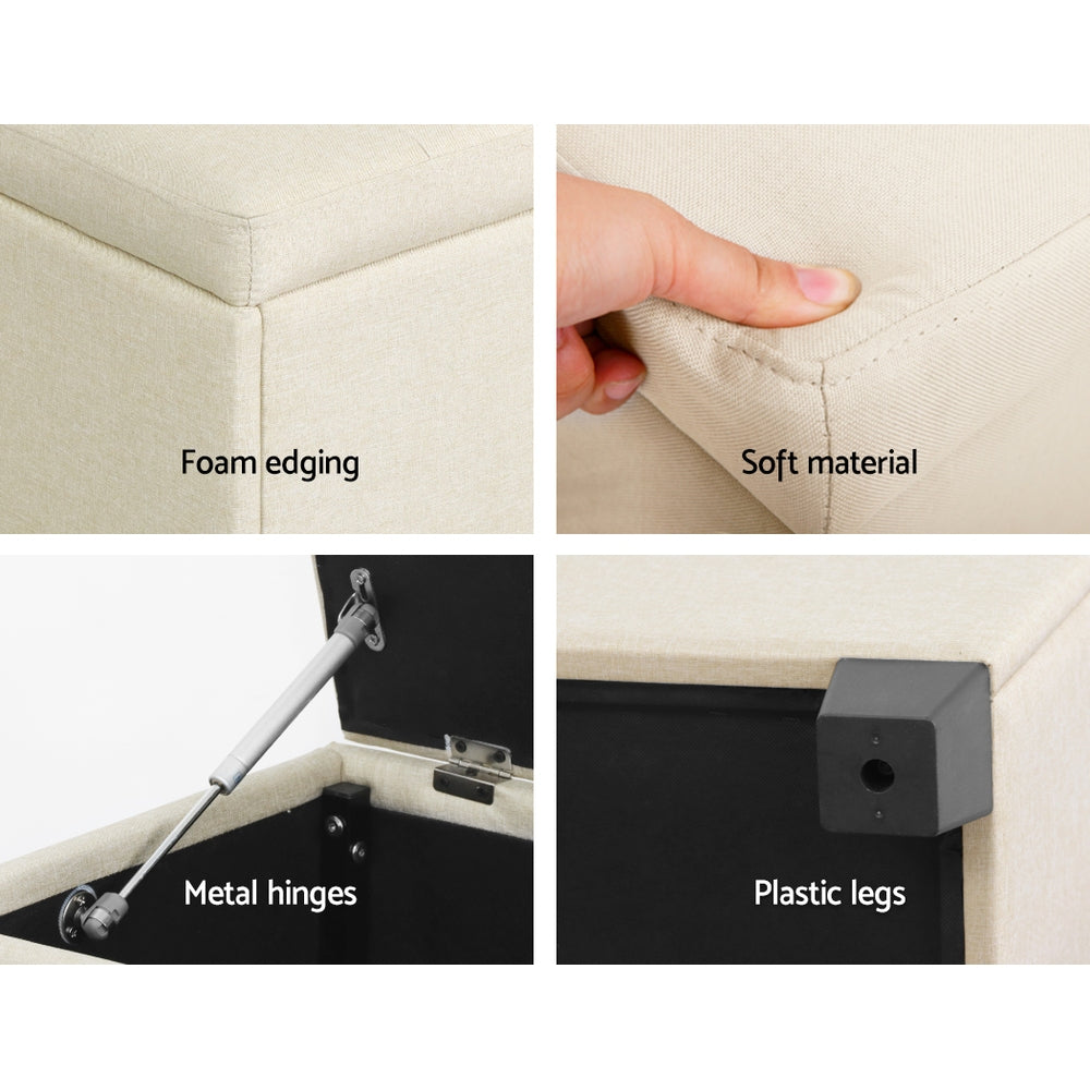 Detailed close-up of Large Fabric Storage Ottoman - Beige showing foam edging, soft fabric, metal hinges, and plastic legs