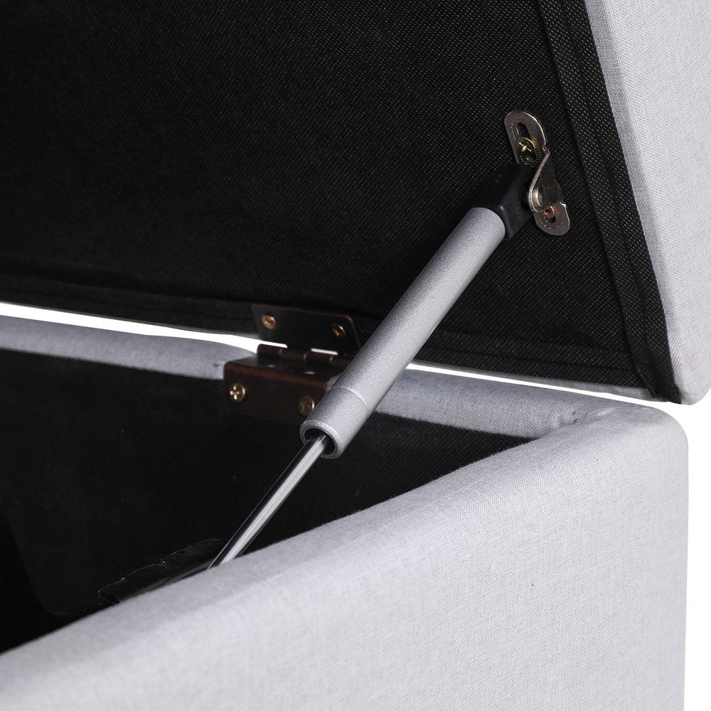 Close-up of gas lift mechanism on Ottoman Storage Sofa Bed 112cm Foldable Grey with grey linen upholstery and storage compartment
