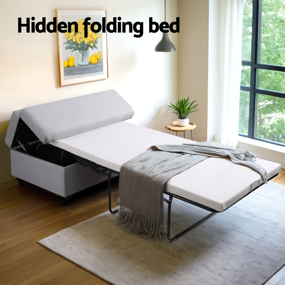 Ottoman Storage Sofa Bed 112cm Foldable Grey with hidden fold-out bed and linen upholstery in bright modern room setting