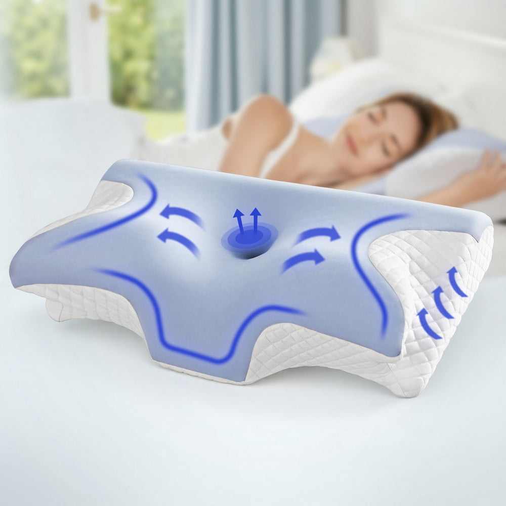 Memory Foam Pillow Ergonomic Contour with butterfly design and airflow features shown in bedroom setting with sleeping woman