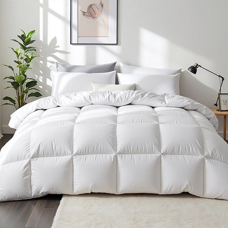 700GSM Duck Down Feather Quilt Duvet Doona Winter Blanket Single on bed with white pillows and minimalist bedroom decor