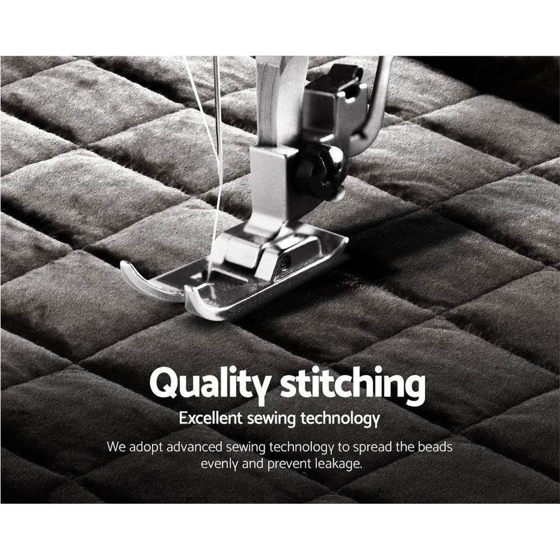 Close-up of sewing machine stitching the Faux Mink Quilt Comforter Throw Blanket Doona Charcoal Queen with quilted pattern detail