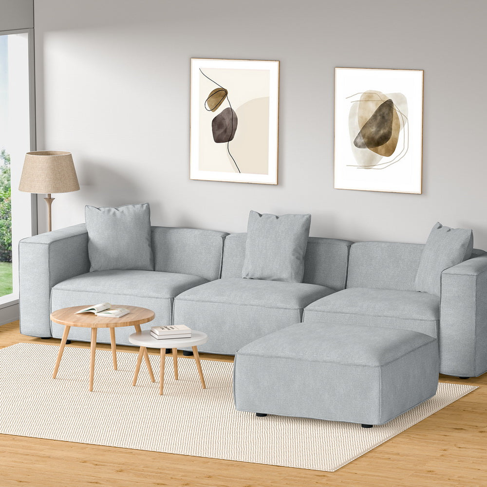 Modular Sofa Chaise Set 4-Seater Grey with soft linen upholstery, chaise lounge, and three matching cushions in modern living room setting