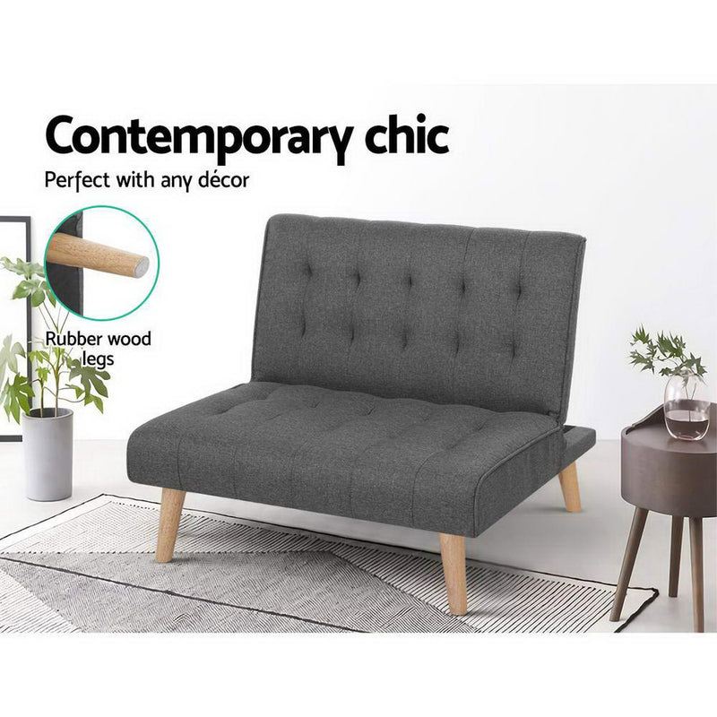 Sofa Lounge Recliner Futon Chair in gray faux linen with tufted backrest, rubber wood legs, shown on patterned rug with side table