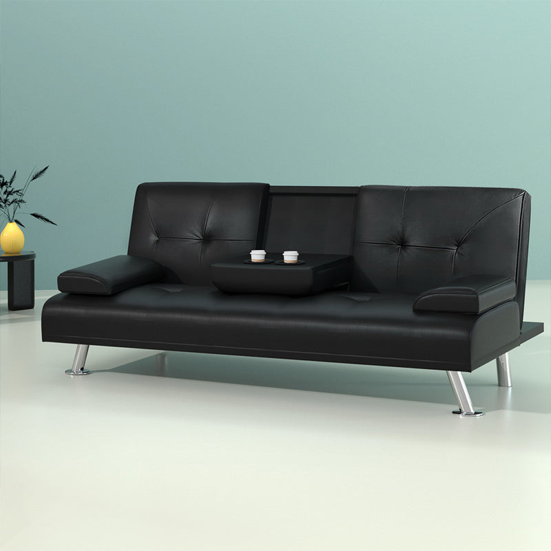 3 Seater PU Leather Sofa Bed - Black with tufted cushions, metal legs, and central tray table on a neutral floor background