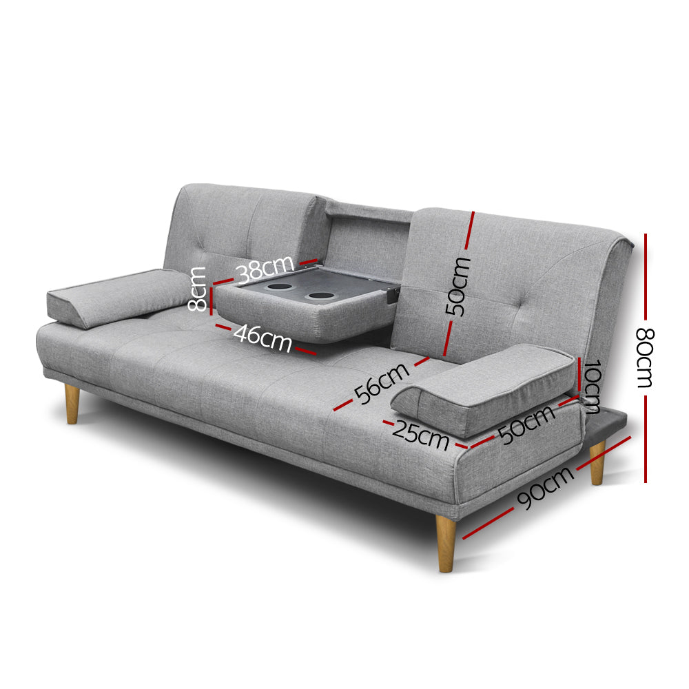 3 Seater Fabric Sofa Bed (Grey) with wooden legs, tufted cushions, and built-in cup holder compartment shown with dimensions.