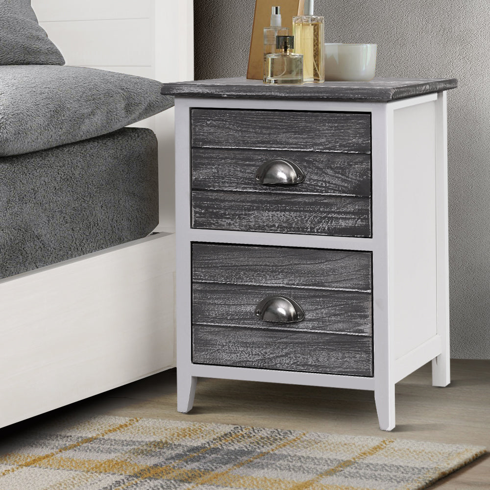 Set of 2 Vintage Style Bedside Tables - Grey & White with two drawers and metal cup handles beside bed on patterned rug