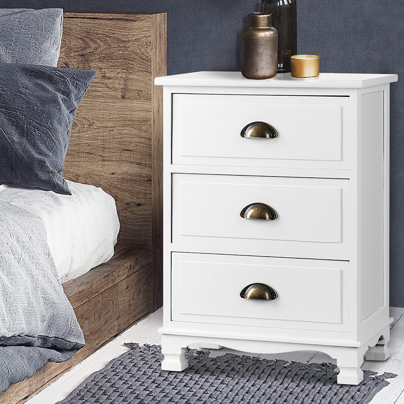 2x Bedside Table 3 Drawers Vintage - THYME White with curved accents, metal handles, shown next to wooden bed frame and decor