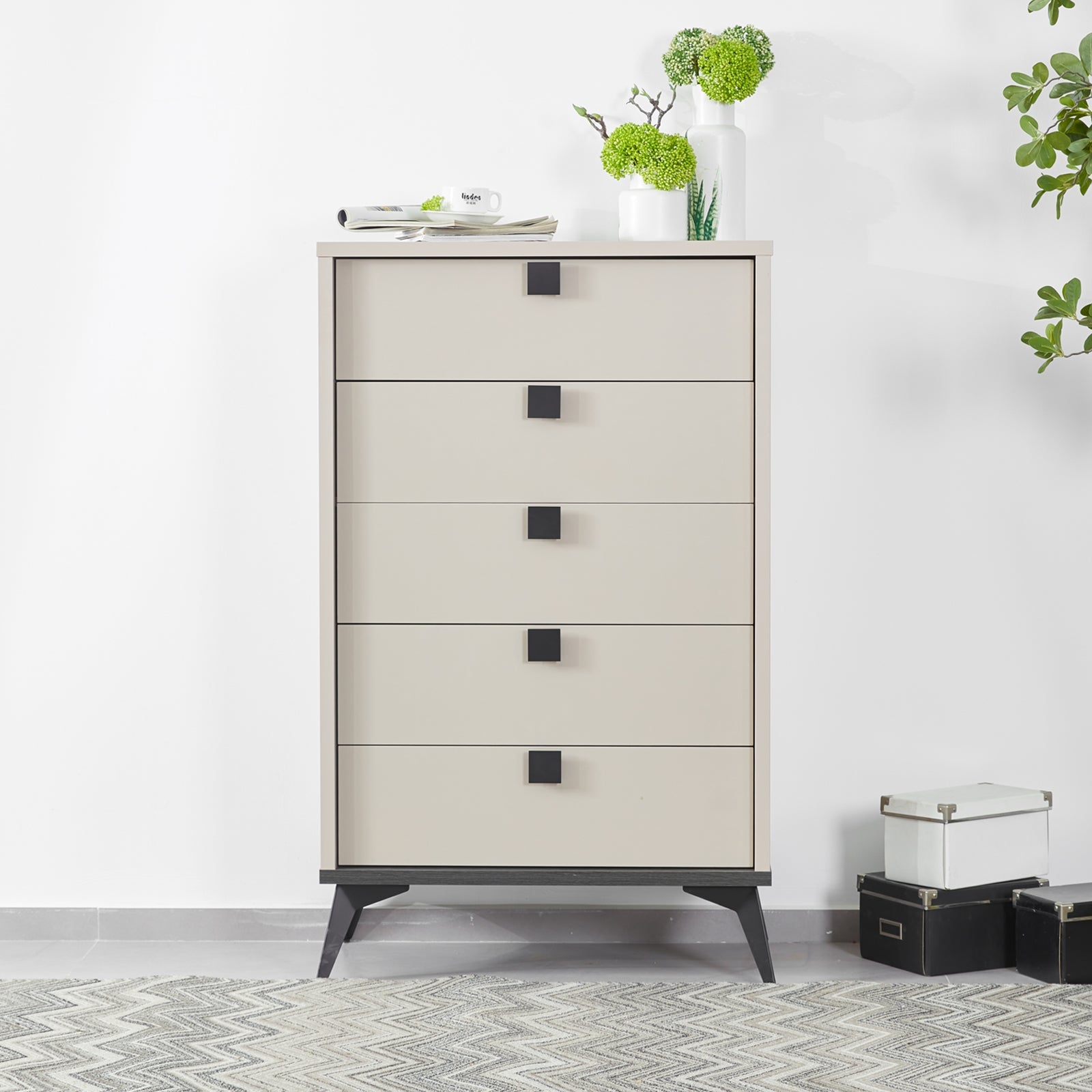 Tallboy with 5 Storage Drawers MDF Combination of Champagne and Black Colour with black handles on angled legs in minimal bedroom setting