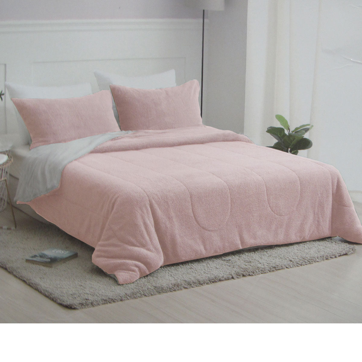 Nolan Blush 4 Piece Comforter Set Queen in soft blush with fleecy texture displayed on queen bed in modern bedroom setting