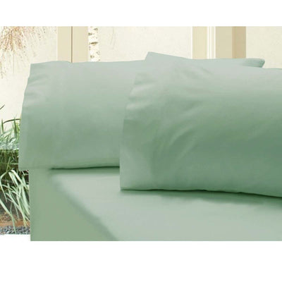 Revive 400TC Cotton Sateen Combo Set King Frost green fitted sheet and pillowcases on bed by Bedzy in bright bedroom setting