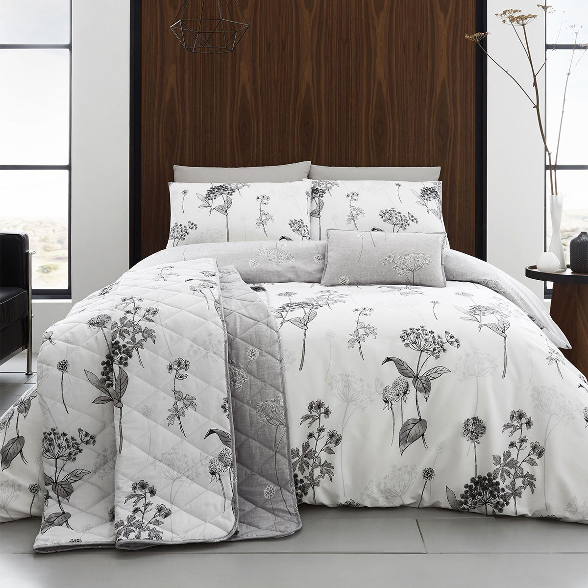 Coverley Grey Quilt Cover Set King with floral print, cotton rich fabric, displayed on styled bed with matching cushions and quilted blanket