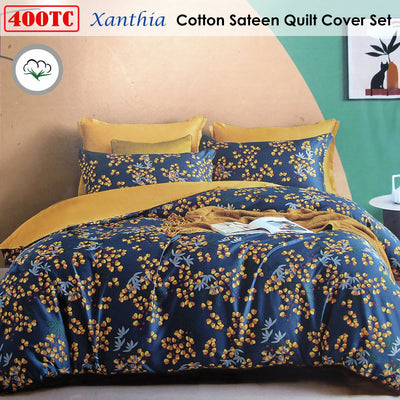 400TC Cotton Sateen Quilt Cover Set Xanthia Queen with navy floral print and mustard yellow accents on bed in bedroom setting
