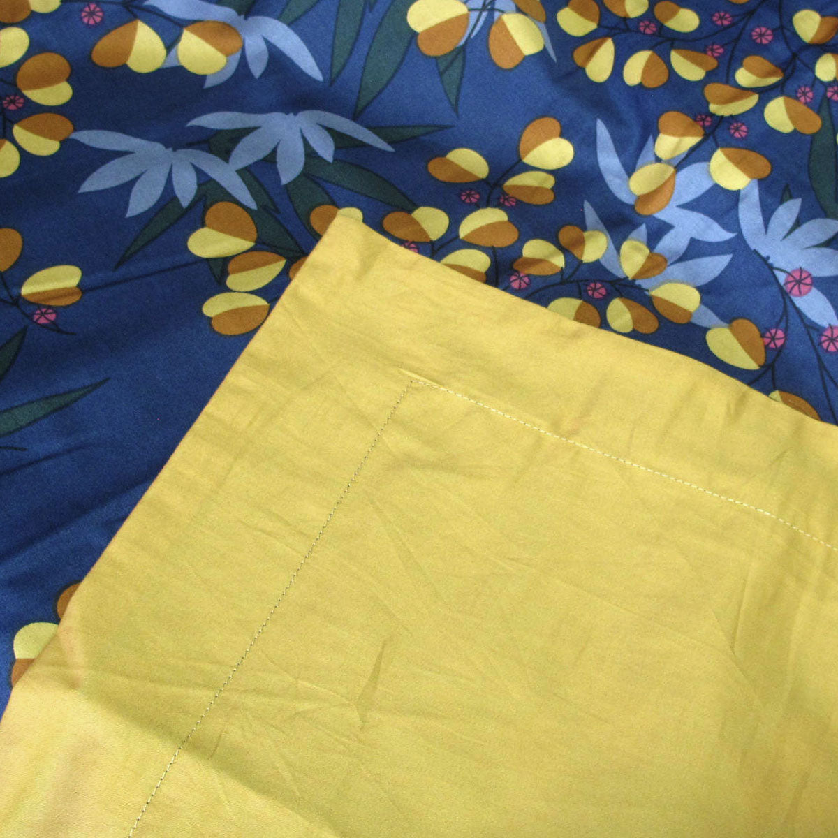 Close-up of 400TC Cotton Sateen Quilt Cover Set Xanthia Queen with floral navy and yellow print for bedroom decor