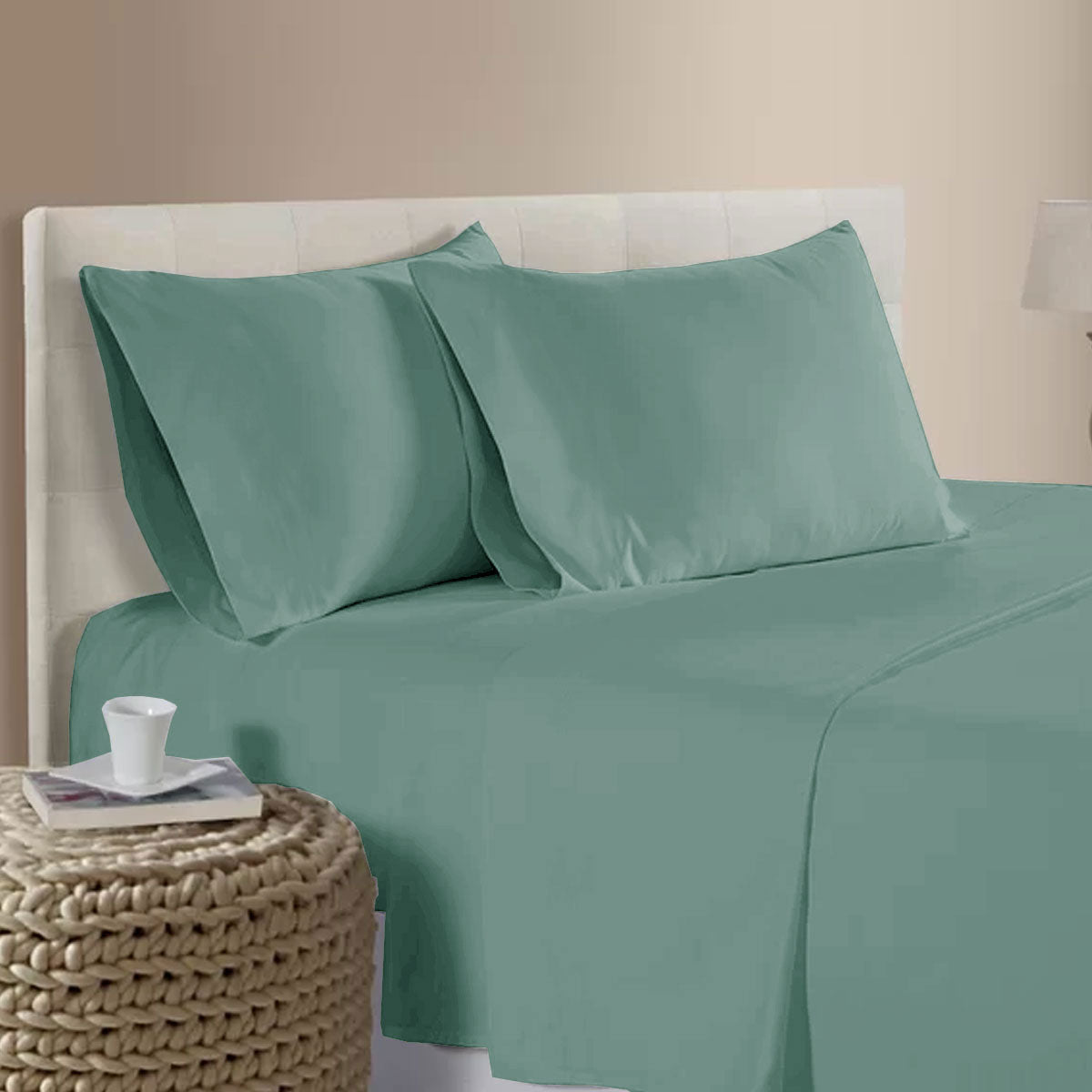 400TC Bamboo Cotton Sheet Set Light Teal Queen on bed with matching pillowcases, white upholstered headboard, and wicker side table