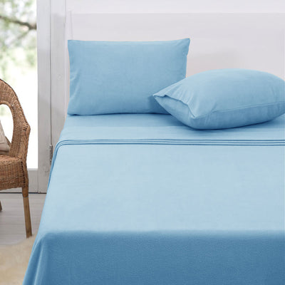 Polar Fleece Sheet Set Queen 36cm Wall Sky in soft sky blue on bed with two matching pillows in bright room