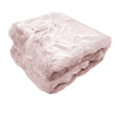 Ariana Long Fleece Faux Fur Throw Rug Pink folded to show its plush soft texture for cozy bedroom decor by Bedzy